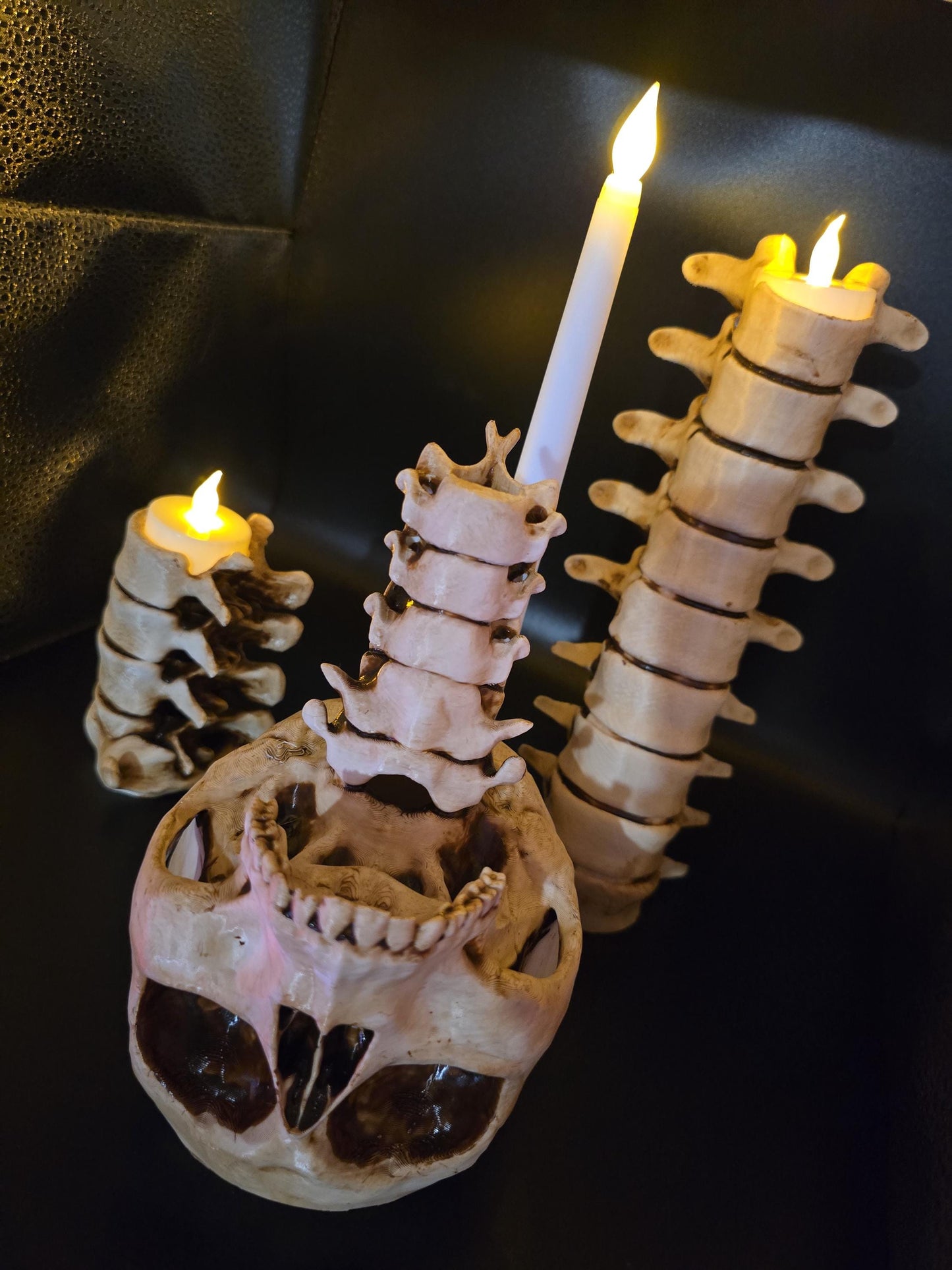 Gothic realistic spine and skull candle holders
