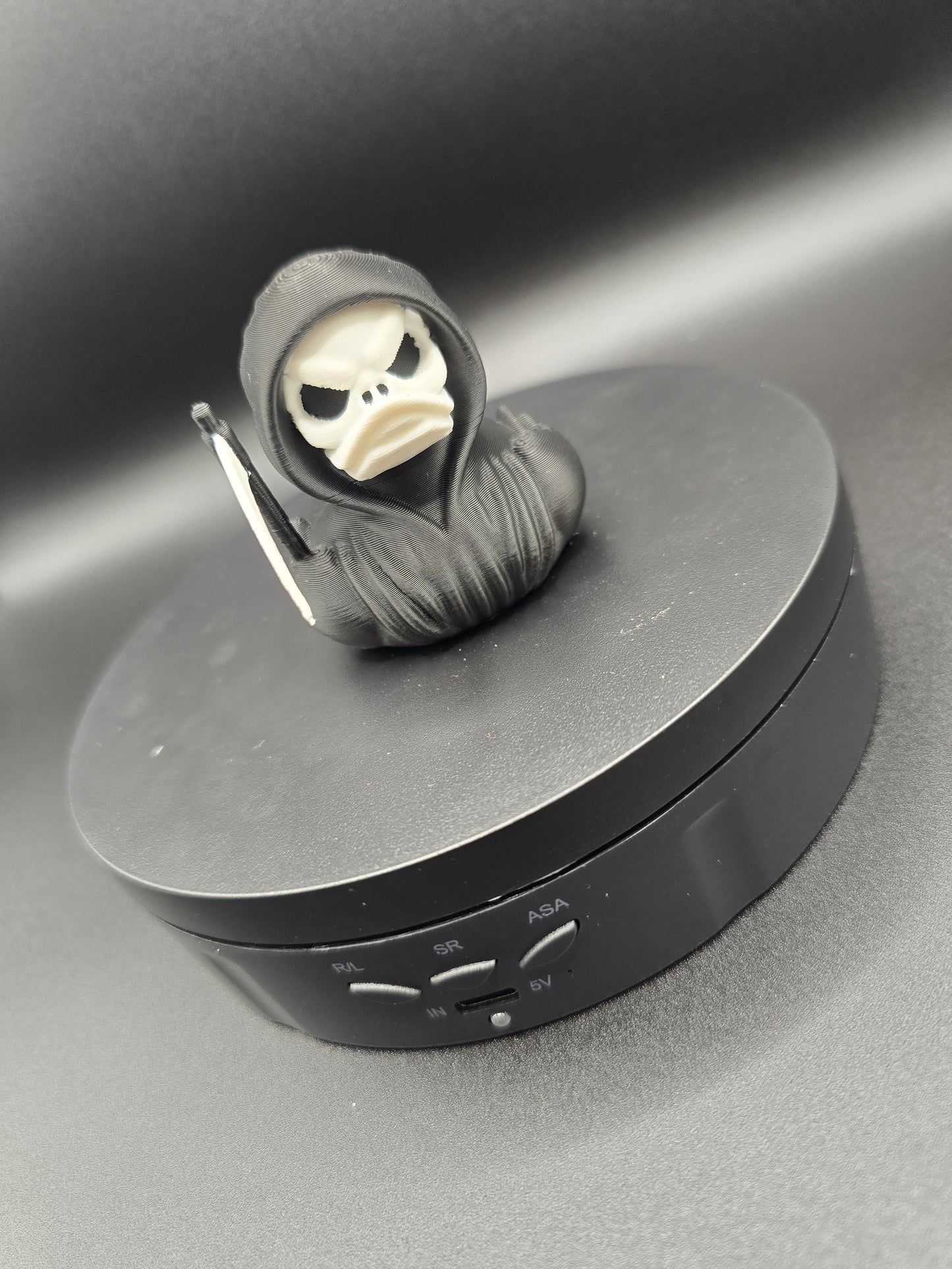 Grim reaper duck figurine