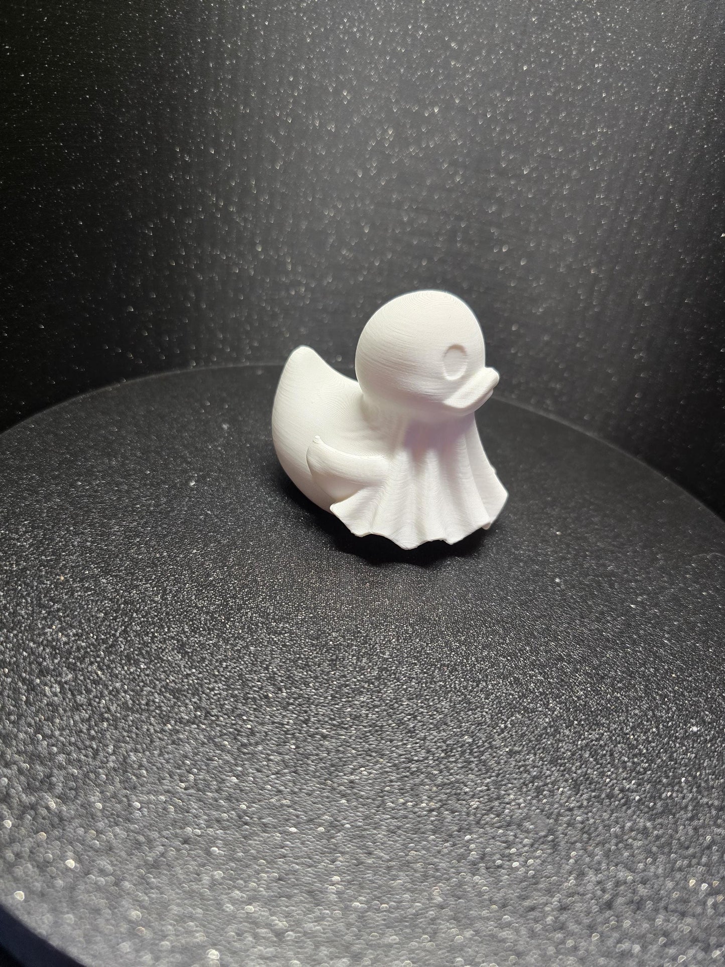 Ghost duck figurine
