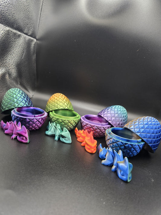Articulated baby dragon with egg
