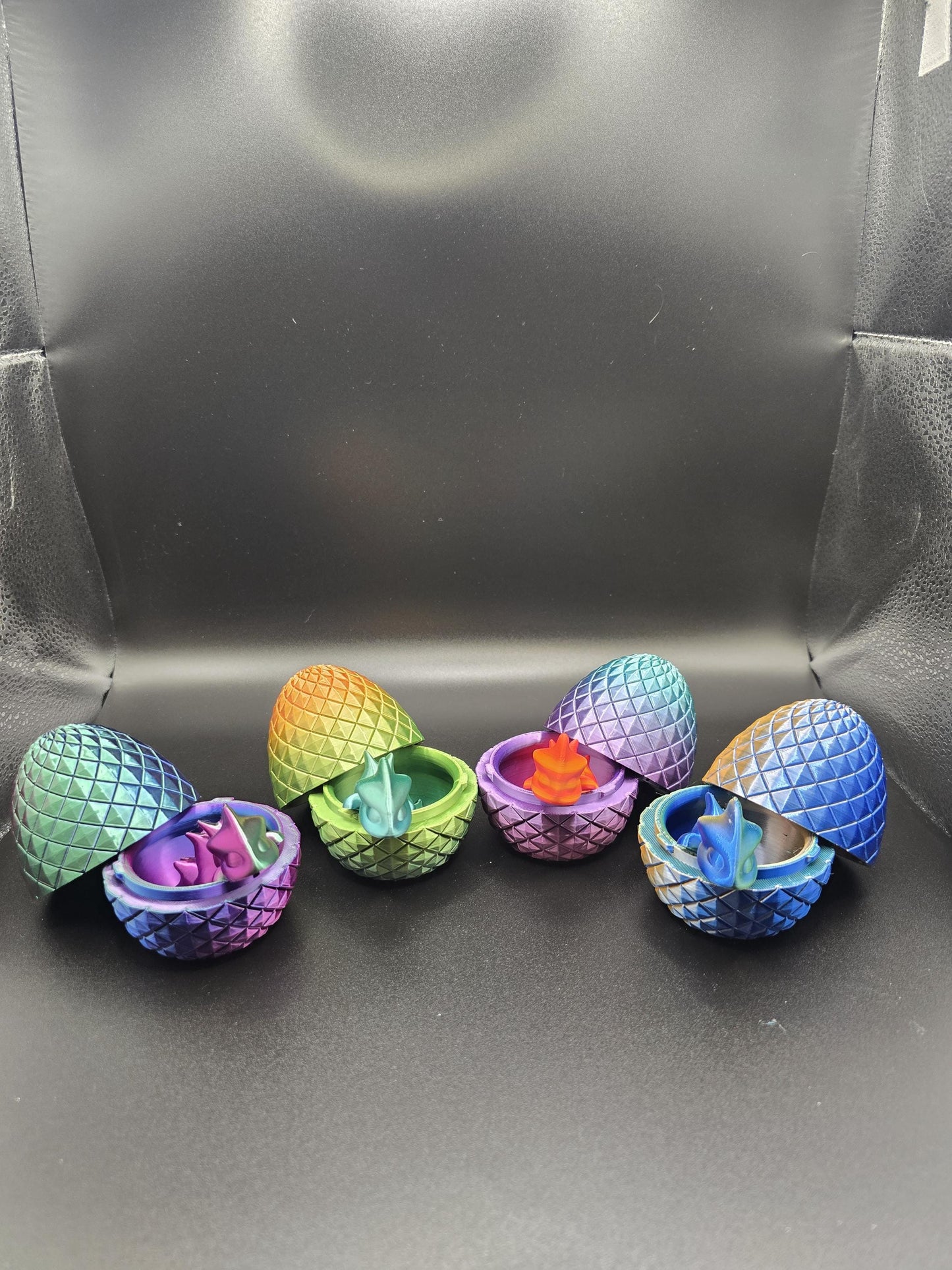 Articulated baby dragon with egg